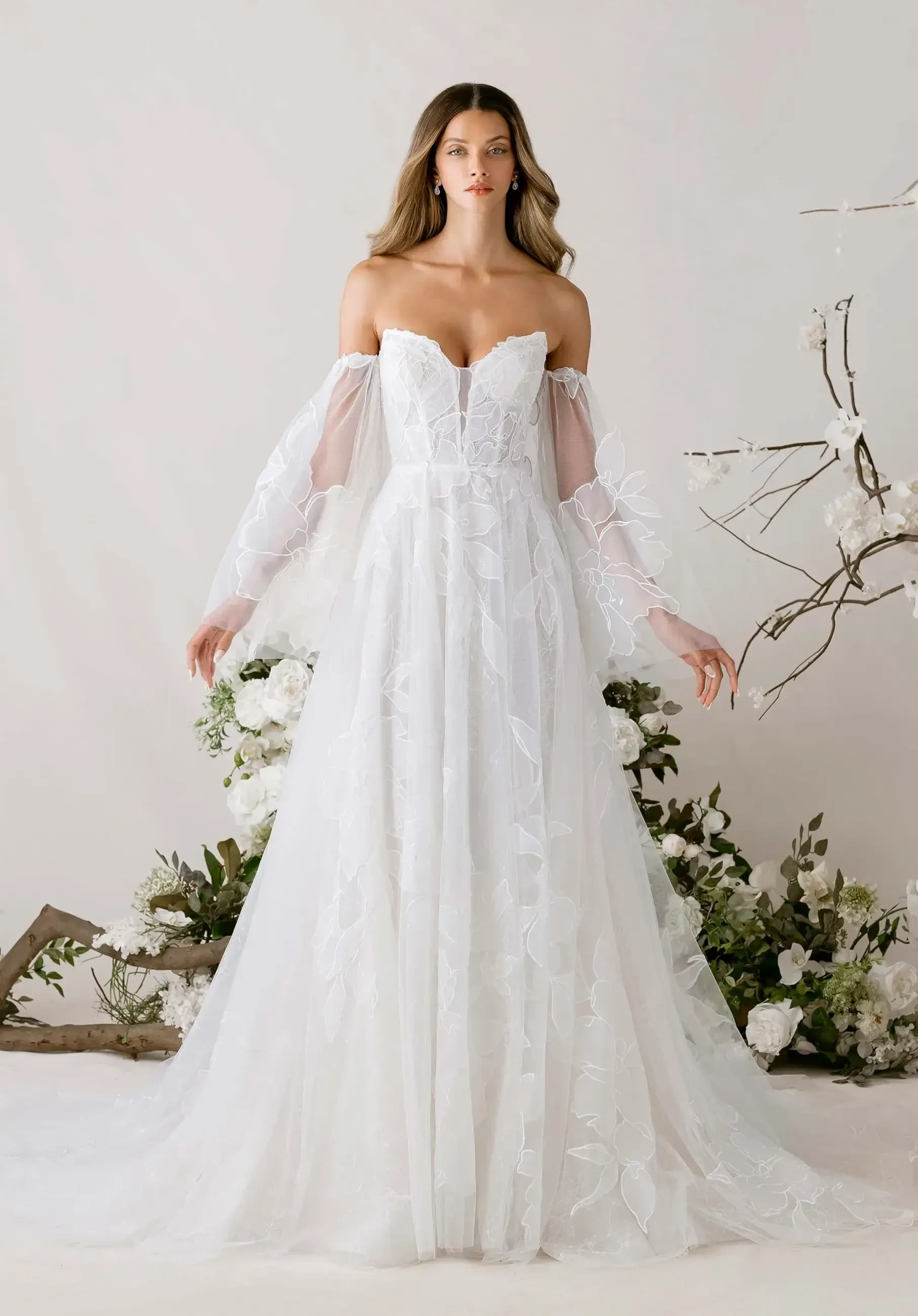 model is wearing an a-line bridal gown