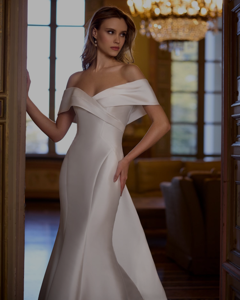 Model wearing a white gown