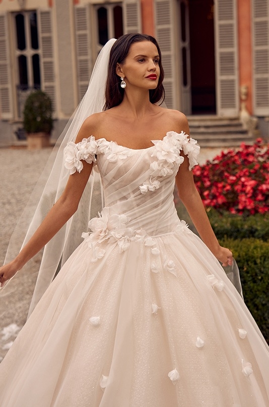 Model wearing a Ballgowns style gown