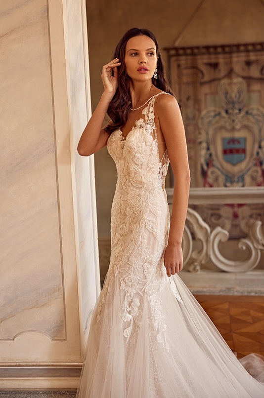 Model wearing a Timeless Lace style gown