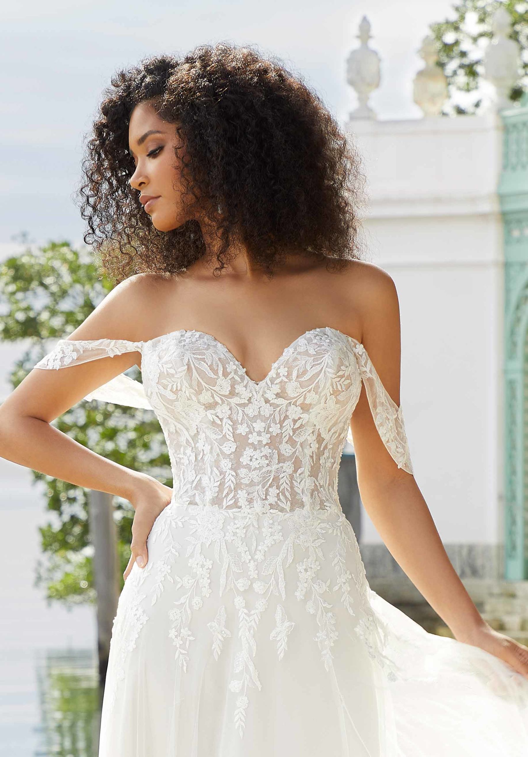 Featured Wedding Dress: Nico by L'Amour - Darianna Bridal & Tuxedo